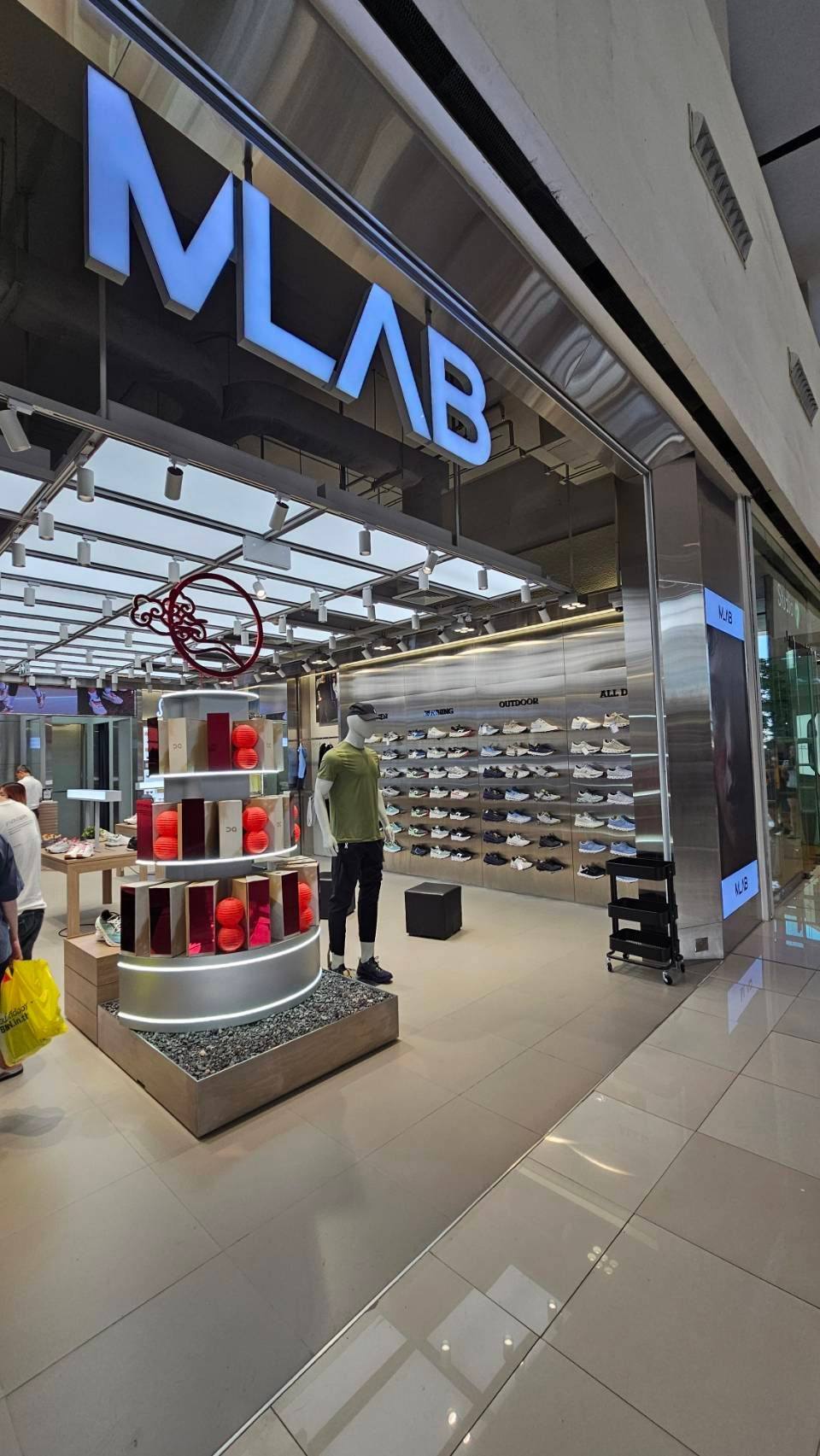 MLAB store backlit signage ceiling